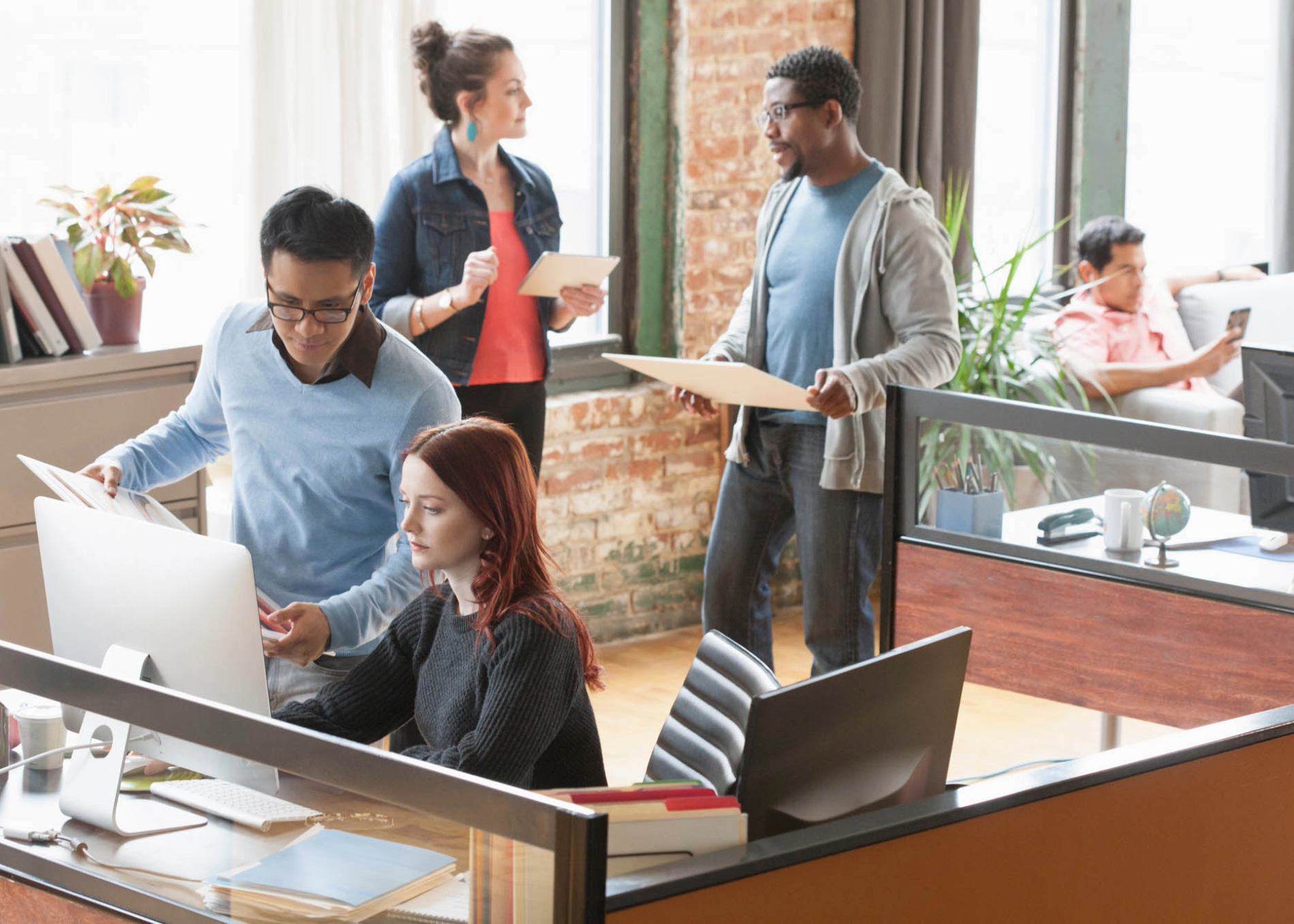 Diverse team collaborating in a modern office.