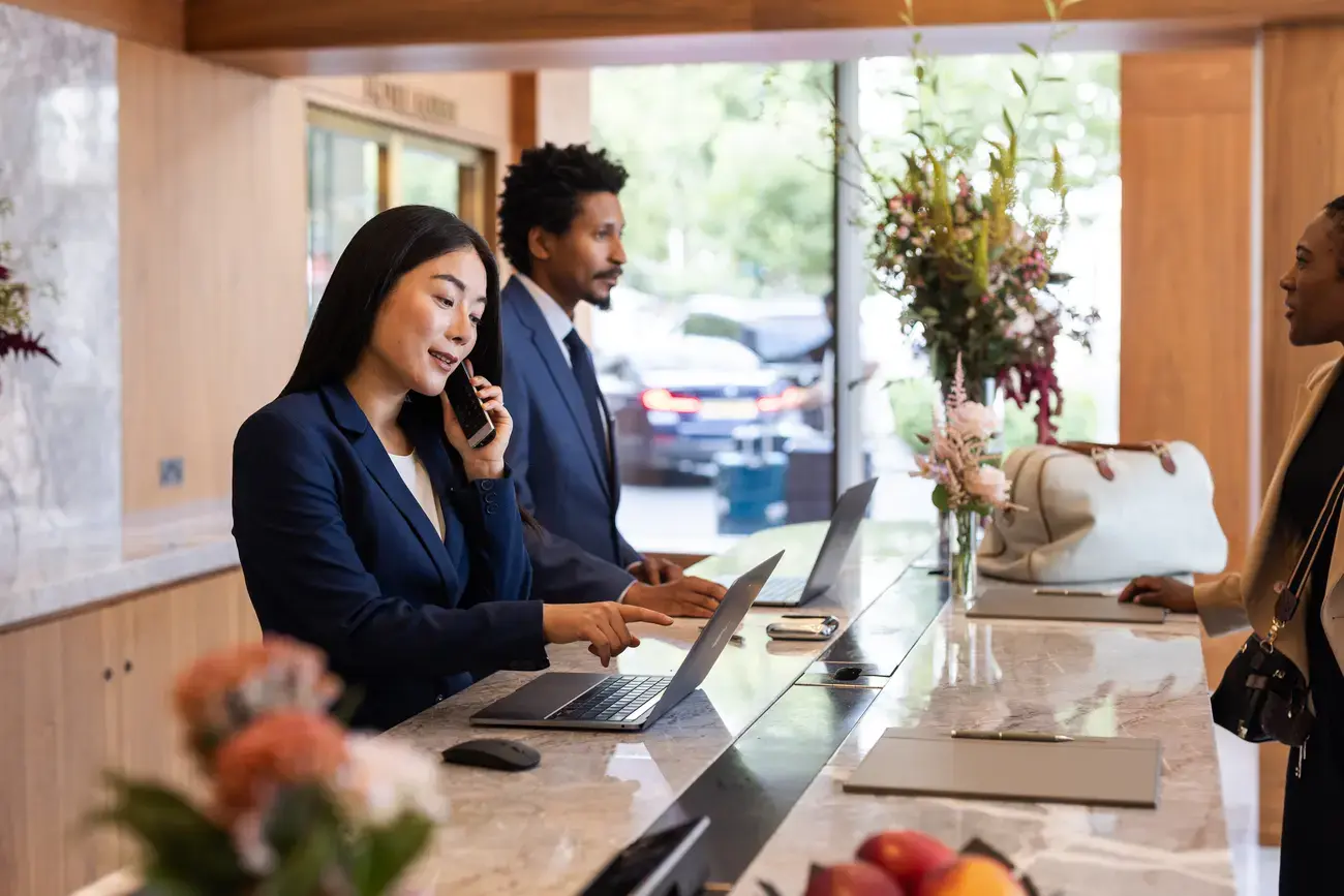 Hotel receptionists at work.